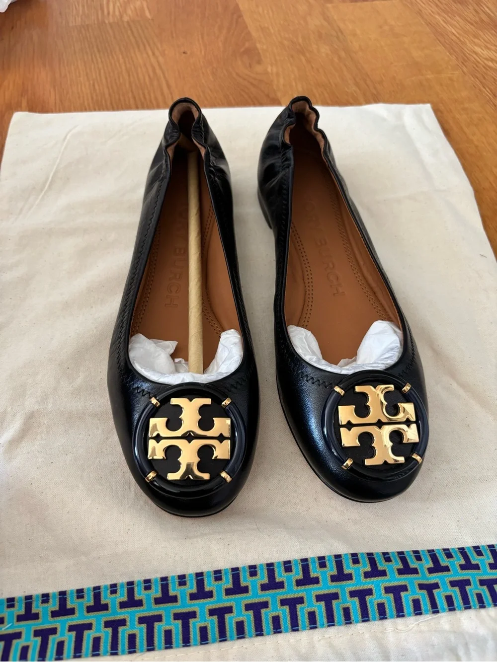 Brand New Tory Burch Black Leather Ballet Flats with Gold Medallion-Never worn
